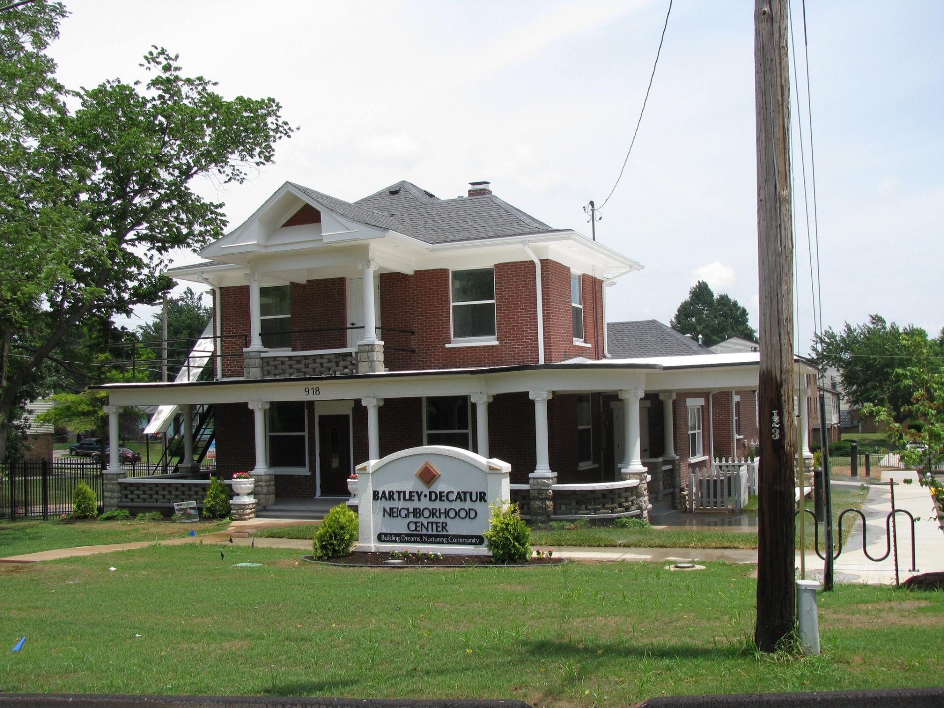 The historic Bartley-Decatur Neighborhood Center, a two-story red brick building from 1900 at 918 E. Calhoun in Springfield, Missouri